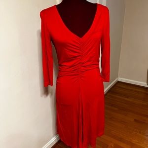 Form-fitting, soft stretchy sexy red dress.